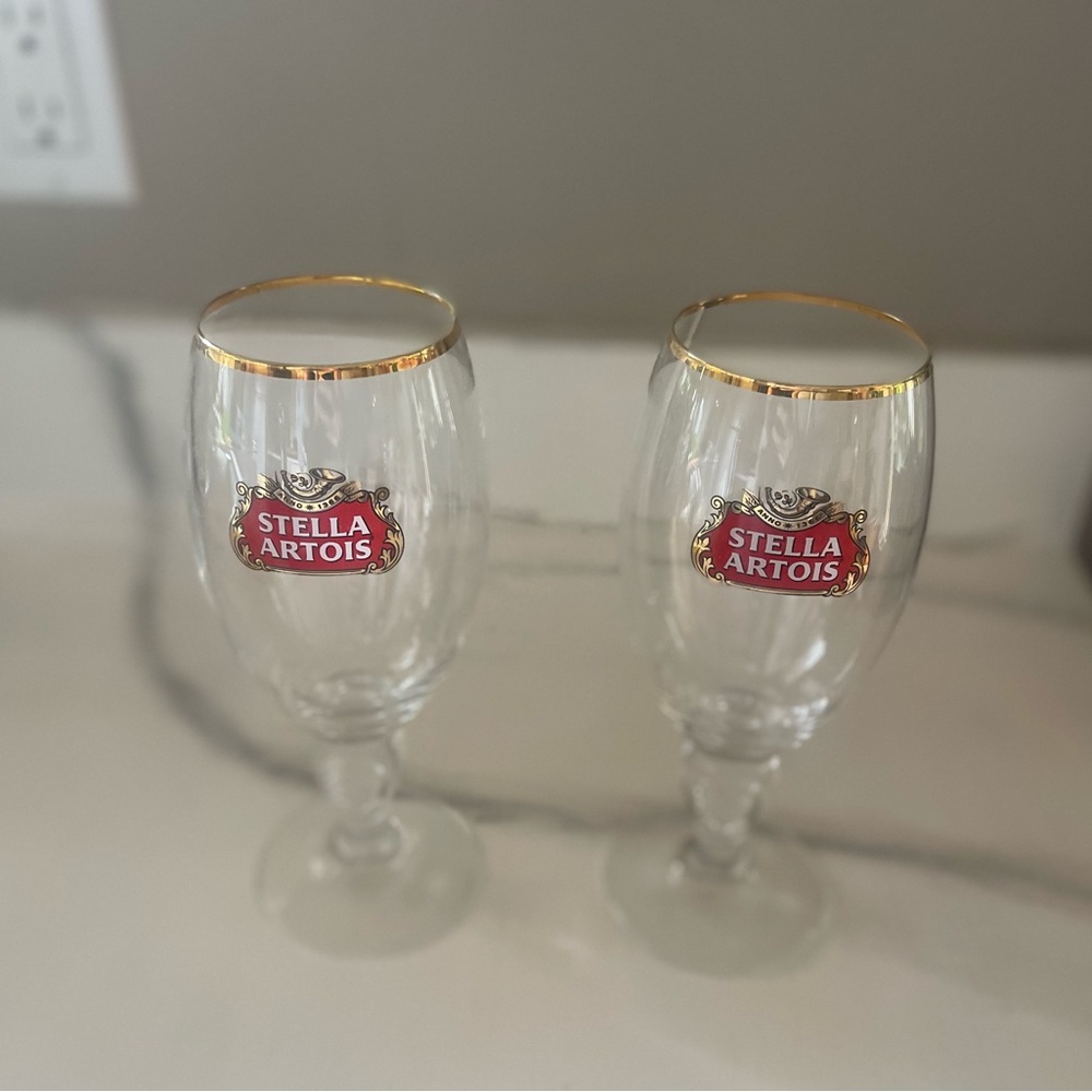 Stella beer wine glasses goblets large clear gold rim set of 2 collectible